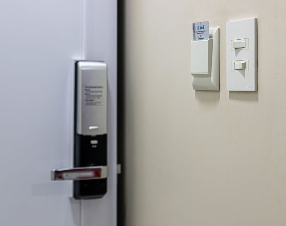 Classic Quadruple Room | Minibar, in-room safe, desk, laptop workspace