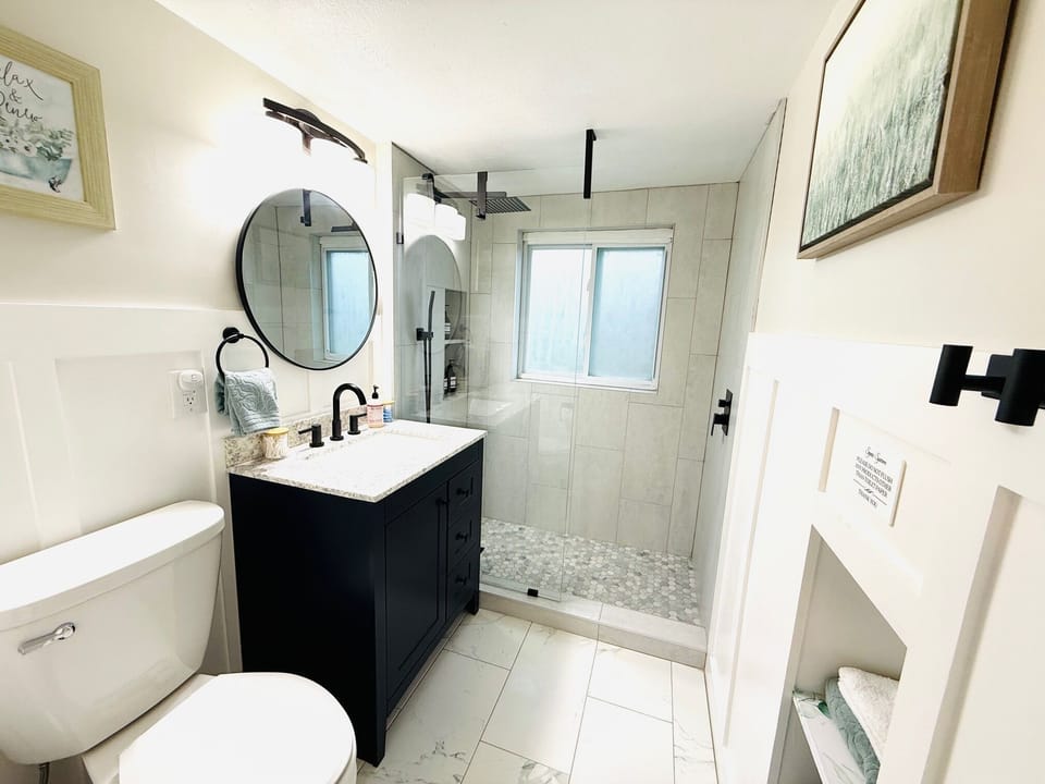 Brand new 2nd floor ensuite bath with walk in shower and rain fall shower head