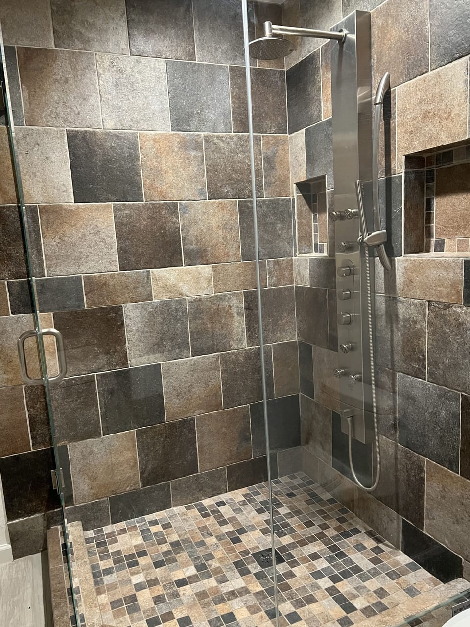 Oversized walk in shower in guest bathroom