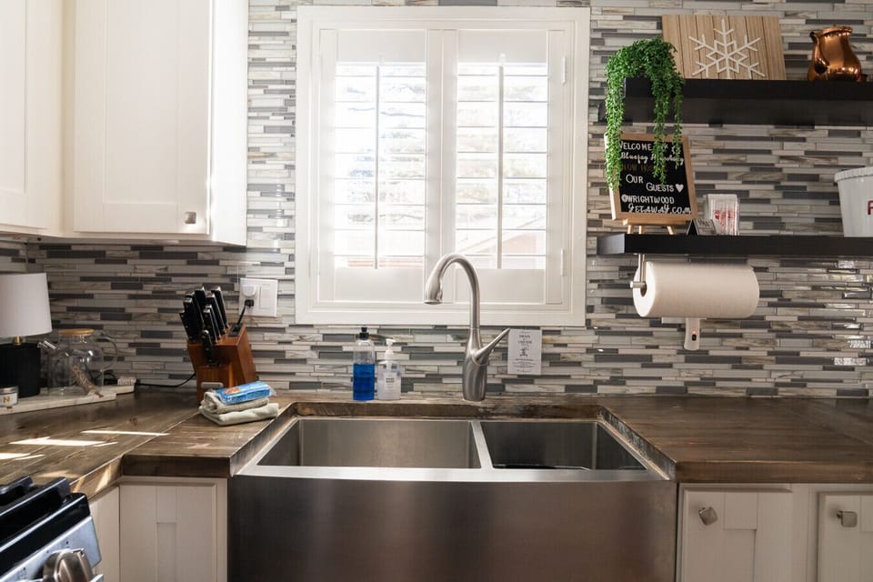 Cozy, inviting sink area with natural light