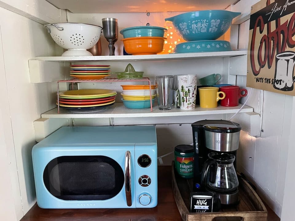 Open pantry with Fiestaware. Silverware, Farberware pots and pans, and many extras!