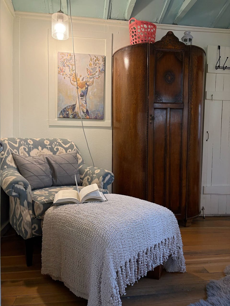 Large bedroom with an area to sit down and unwind.