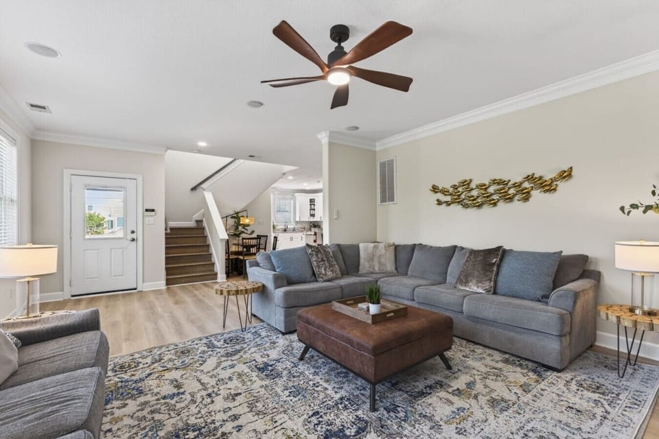 Relax in the spacious living room featuring an oversized sectional with seating for the whole group.