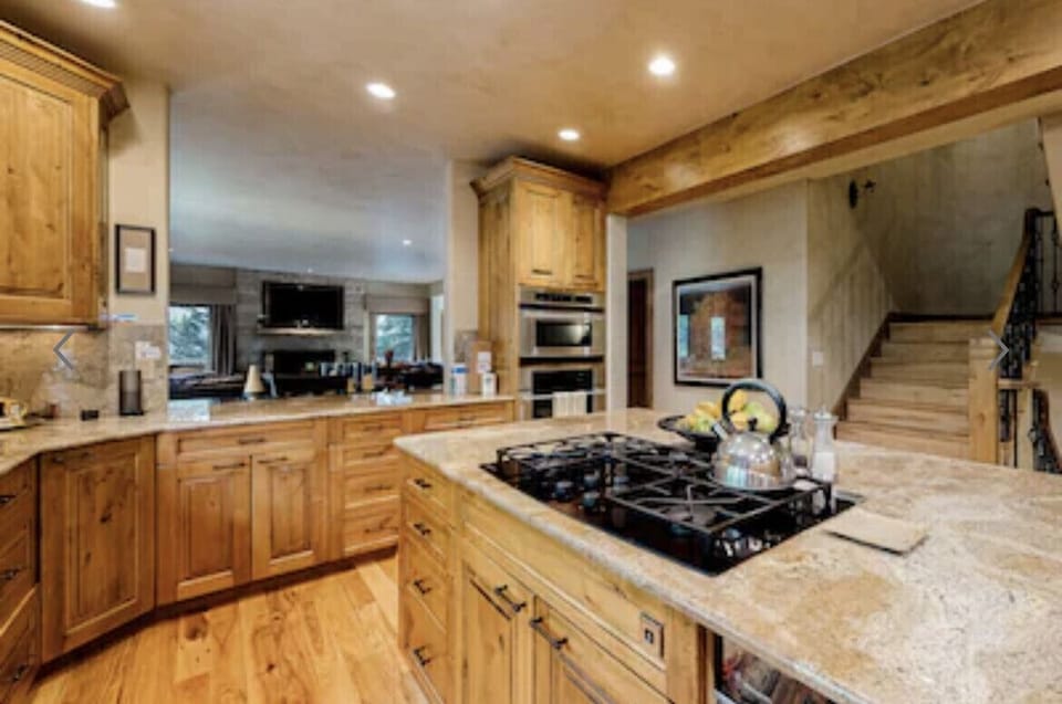 Oversized modern kitchen, dual dish washers, stovetop, fridge, oven & microwave