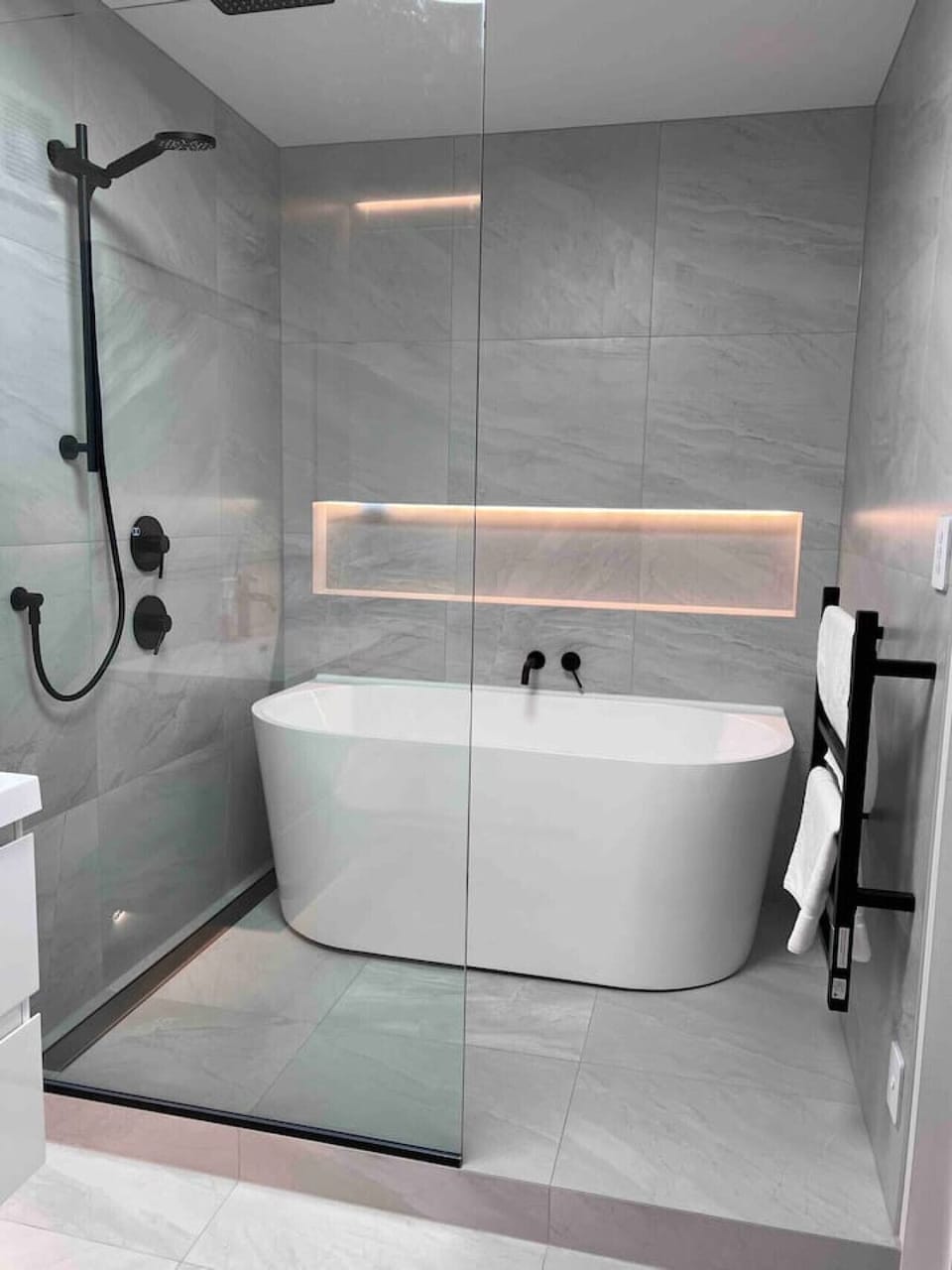Downstairs bathroom - walk-in shower and freestanding bath