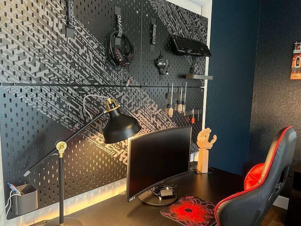 Workspace with desk, gaming chair, monitor, keyboard and headphone you can use!

