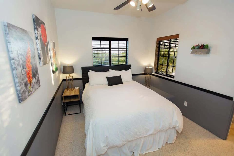 Bedroom 4 on the second floor has great views and includes photographs taken on a hike to Wasson Peak (one of our favorite hikes in Tucson). Like every other bedroom in the house, a private bathroom is attached.