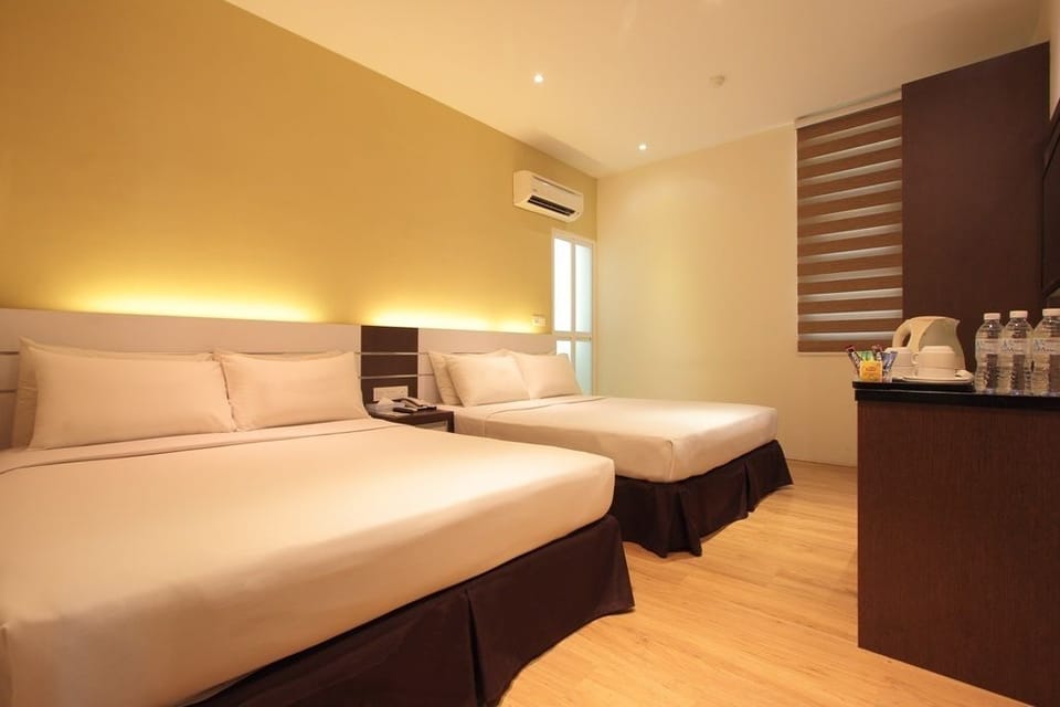 Standard Family Room | Minibar, desk, soundproofing, iron/ironing board (on request)
