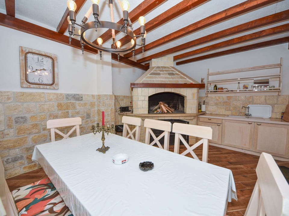 Table, Property, Furniture, Wood, Chair, Interior Design, Cabinetry, Flooring, Floor, Tablecloth