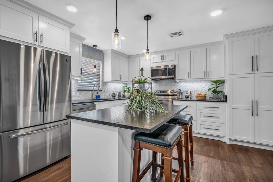 Kitchen with a large island great for entertaining offers extra seating, 