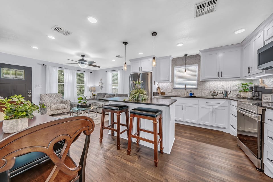 Kitchen has dishes, pots & pans, utensils, silverware, spices, 