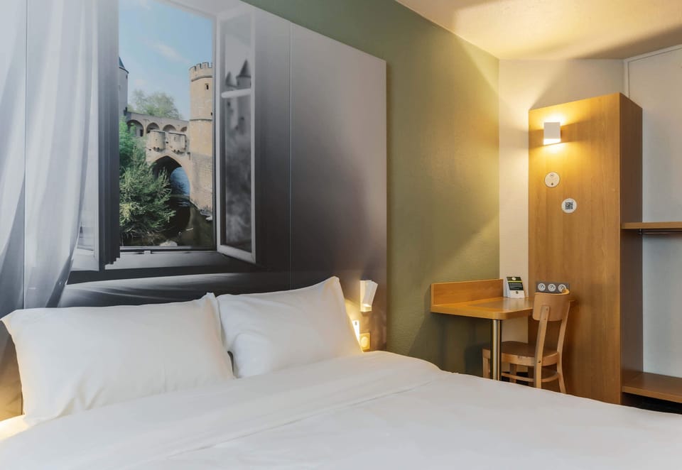 Premium bedding, memory foam beds, desk, blackout drapes