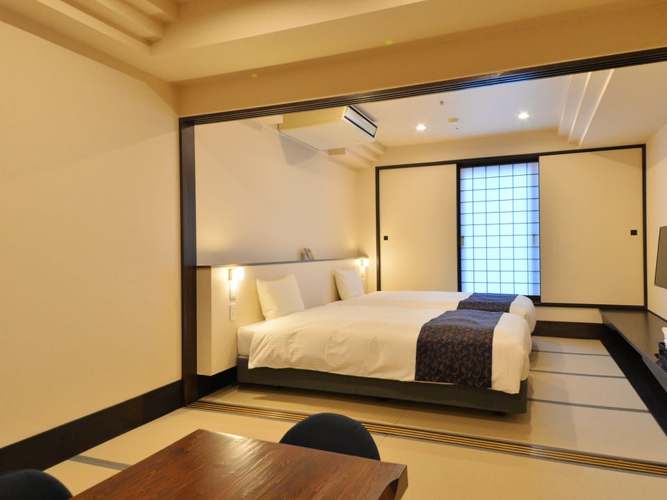 Family Room, Non Smoking,Main Building | Down comforters, blackout drapes, free WiFi, bed sheets