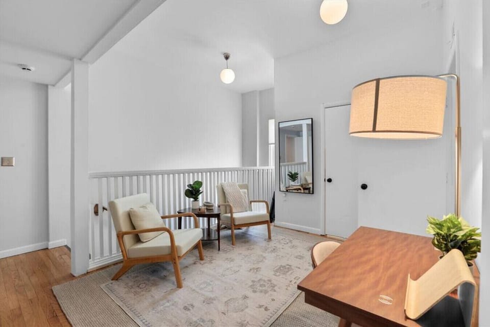 Sitting area at the top of the entry stairs.