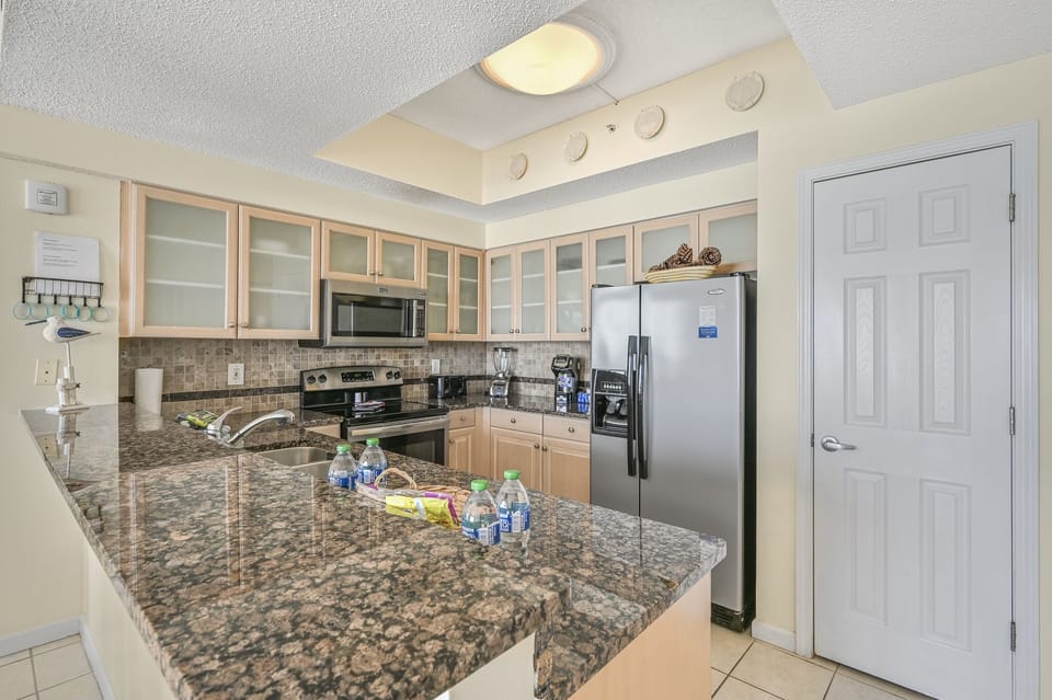 The updated kitchen has granite countertops, stainless steel appliances, and is fully stocked with more than the basics (coffee/tea bar, oils/spices, Tupperware, plenty of pots/pans/cookware) so you and your group can prepare delicious meals while overlook