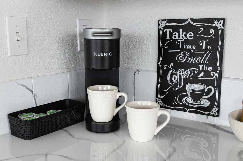 We provide a starter supply of K cups, tea bags, creamer, sugar, and sweetener.