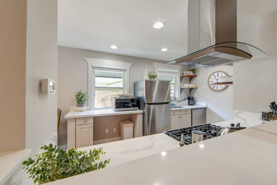 A modern, fully-equipped kitchen has everything you need.