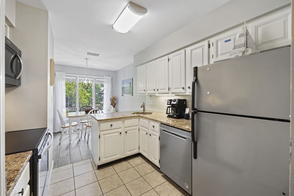 Fully renovated kitchen with new appliances.