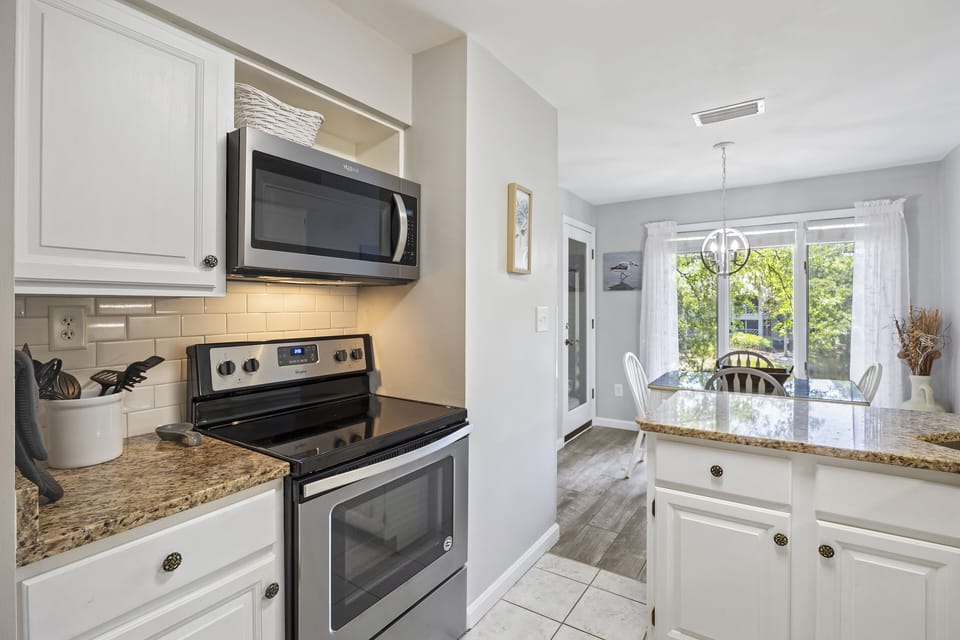 Fully renovated kitchen with new appliances.