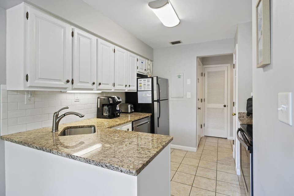 Fully renovated kitchen with new appliances.