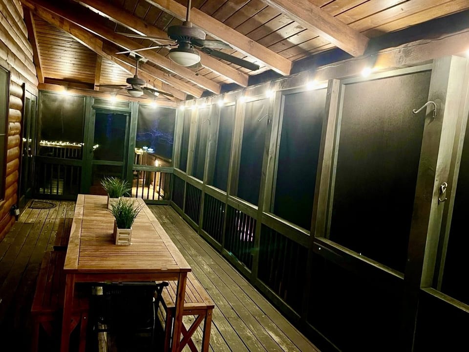 Lights in screened porch at night