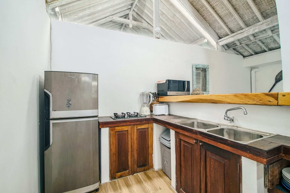 Basic Villa, Multiple Beds | Private kitchen | Fridge, microwave, stovetop, coffee/tea maker