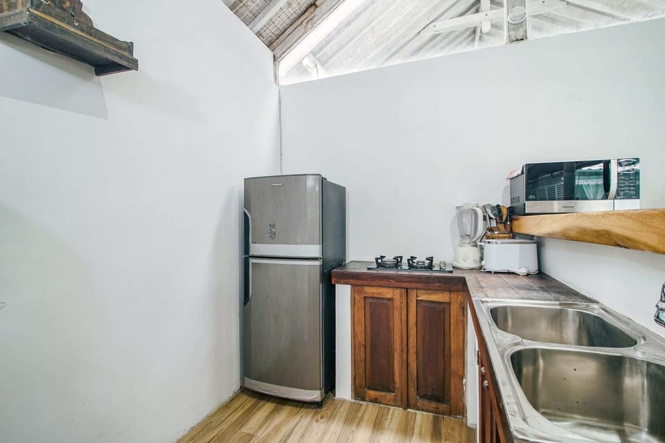 Basic Villa, Multiple Beds | Private kitchen | Fridge, microwave, stovetop, coffee/tea maker