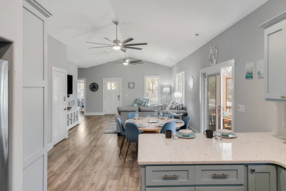 The proximity of the kitchen & dining areas make serving & clean up a breeze.
