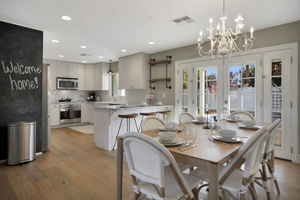 Open layout of the kitchen and dining space seating 6 people