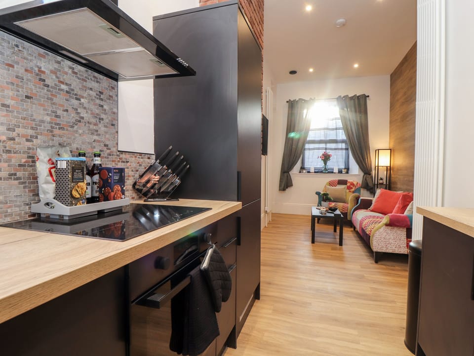 Fridge, electric kettle, cookware/dishes/utensils