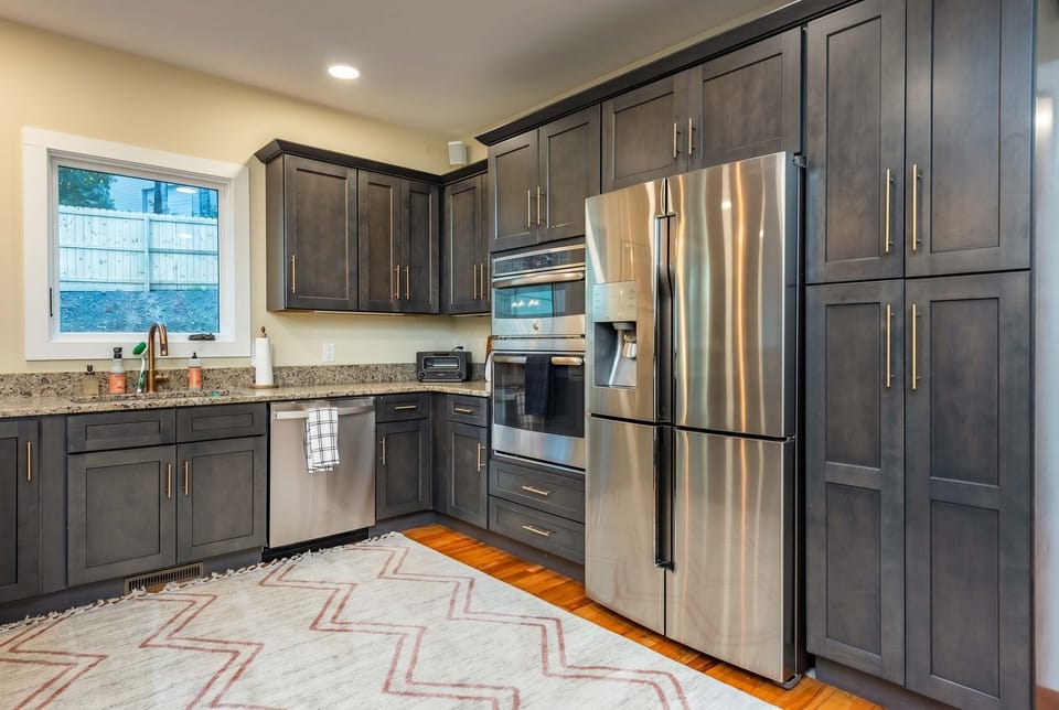 Chef’s Dream Kitchen – Fully stocked with high-end appliances and plenty of cabinetry, making cooking a breeze.
