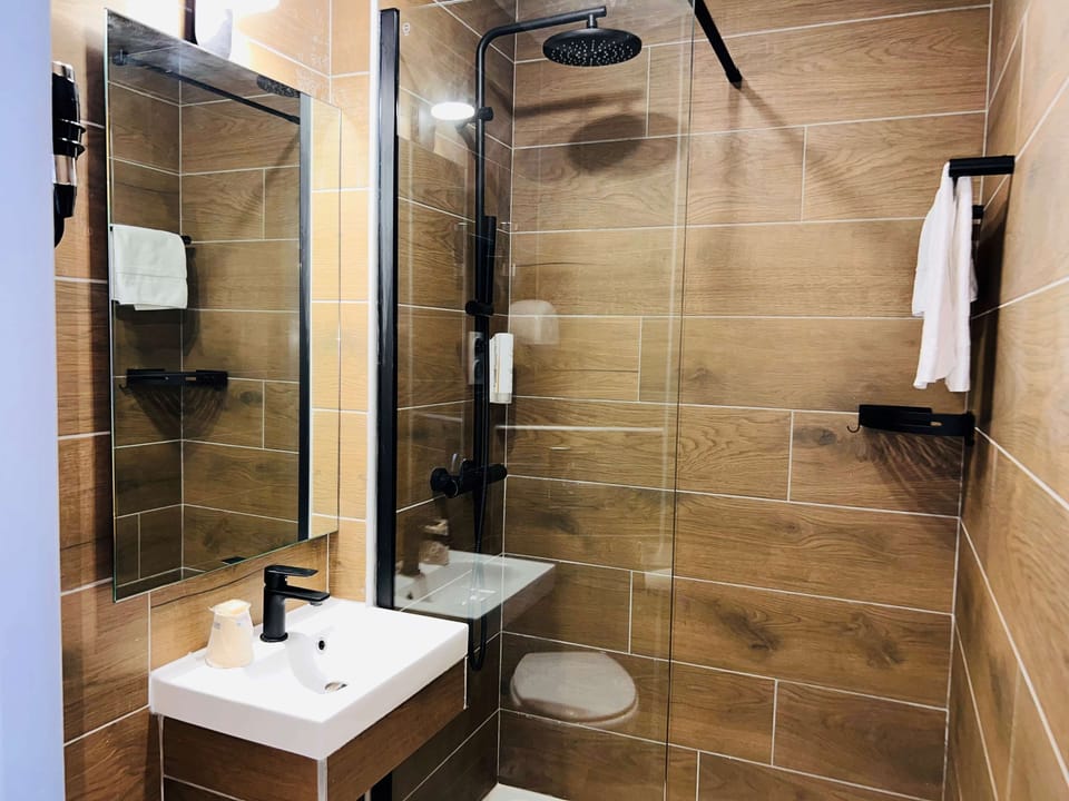 Superior Room, Multiple Beds, Non Smoking | Bathroom | Bathrobes, towels