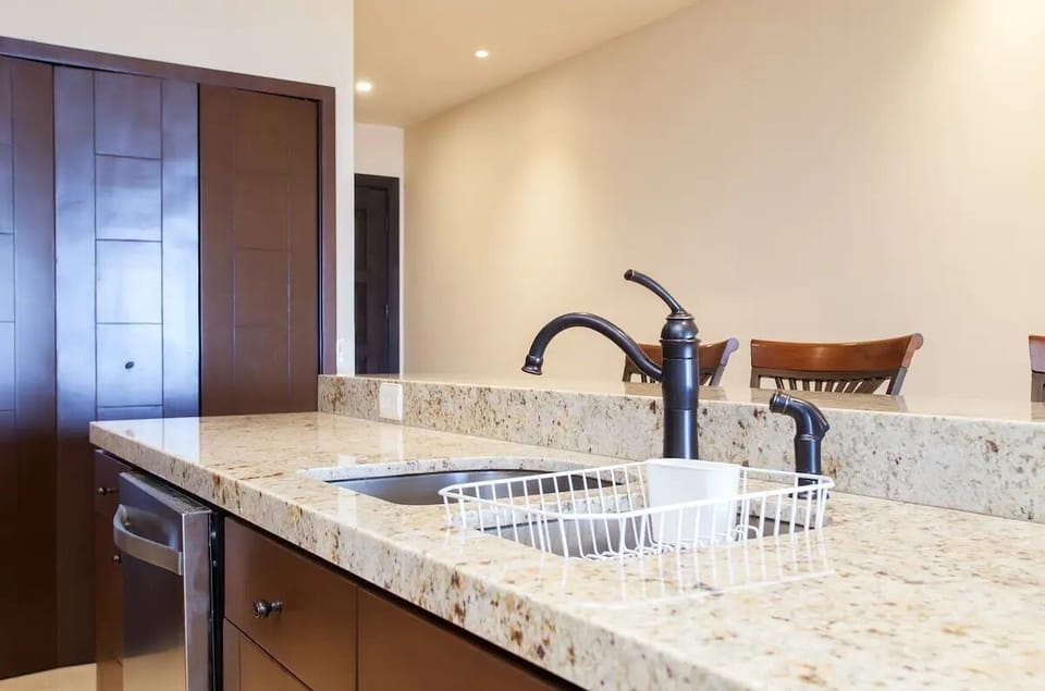 Comfort Condo | Private kitchenette | Fridge, cookware/dishes/utensils