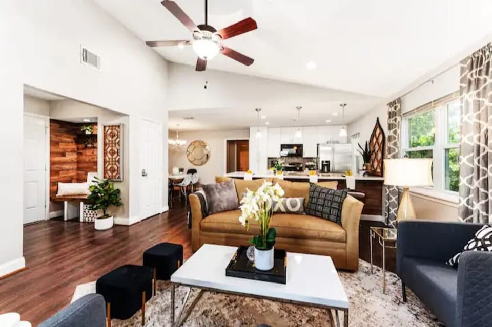 Unwind in a spacious living room with a perfect blend of comfort and style