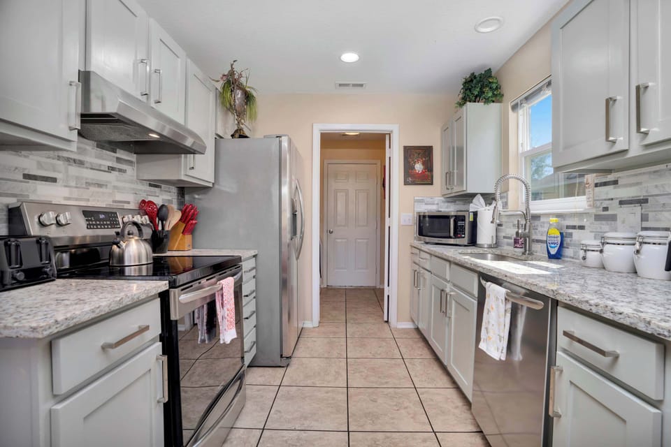 Inspire culinary delights in your thoughtfully equipped kitchen.