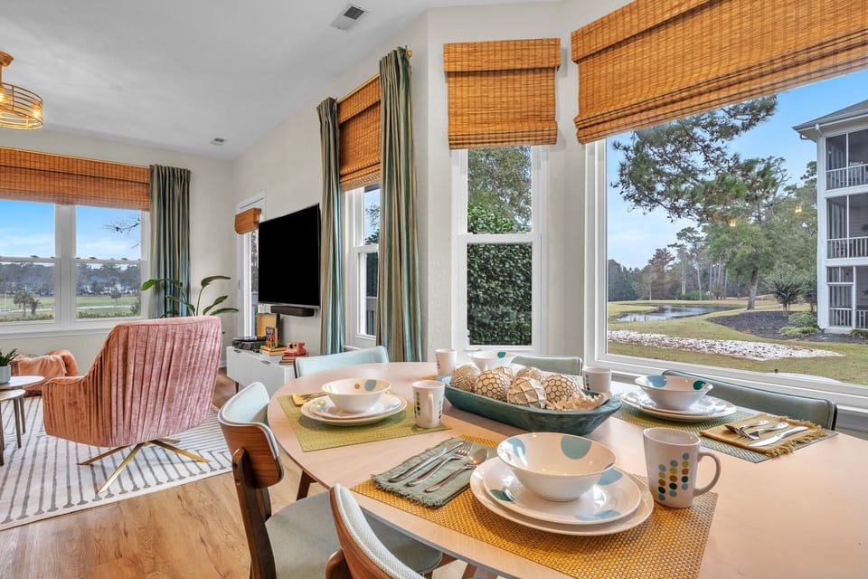 Dining Room table seats six and offers beautiful views.