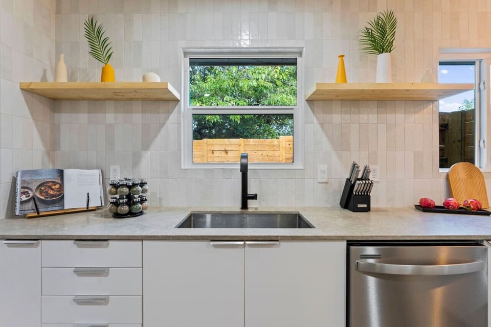 Amenities include: microwave, blender, toaster, various cooking and baking trays, pizza tray, myriad of spices, storage containers, measuring cups and much more..