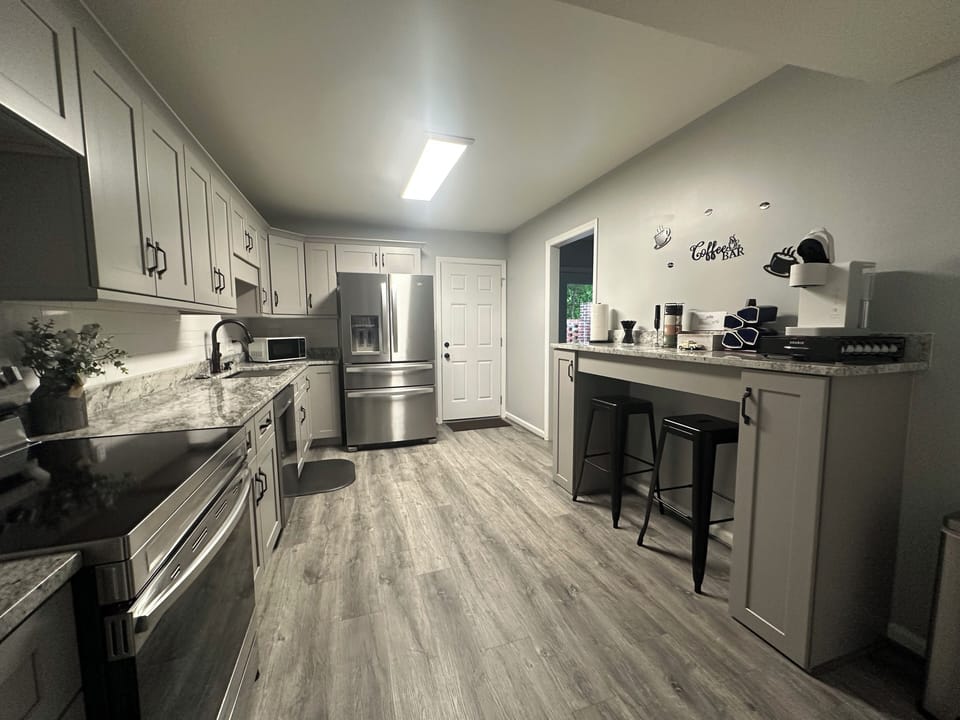 Fully stocked kitchen and coffee bar.