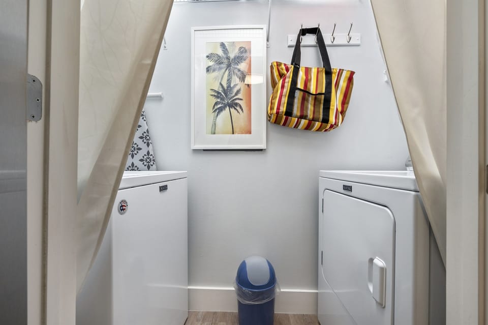 Full size washer and dryer in laundry room off the kitchen.