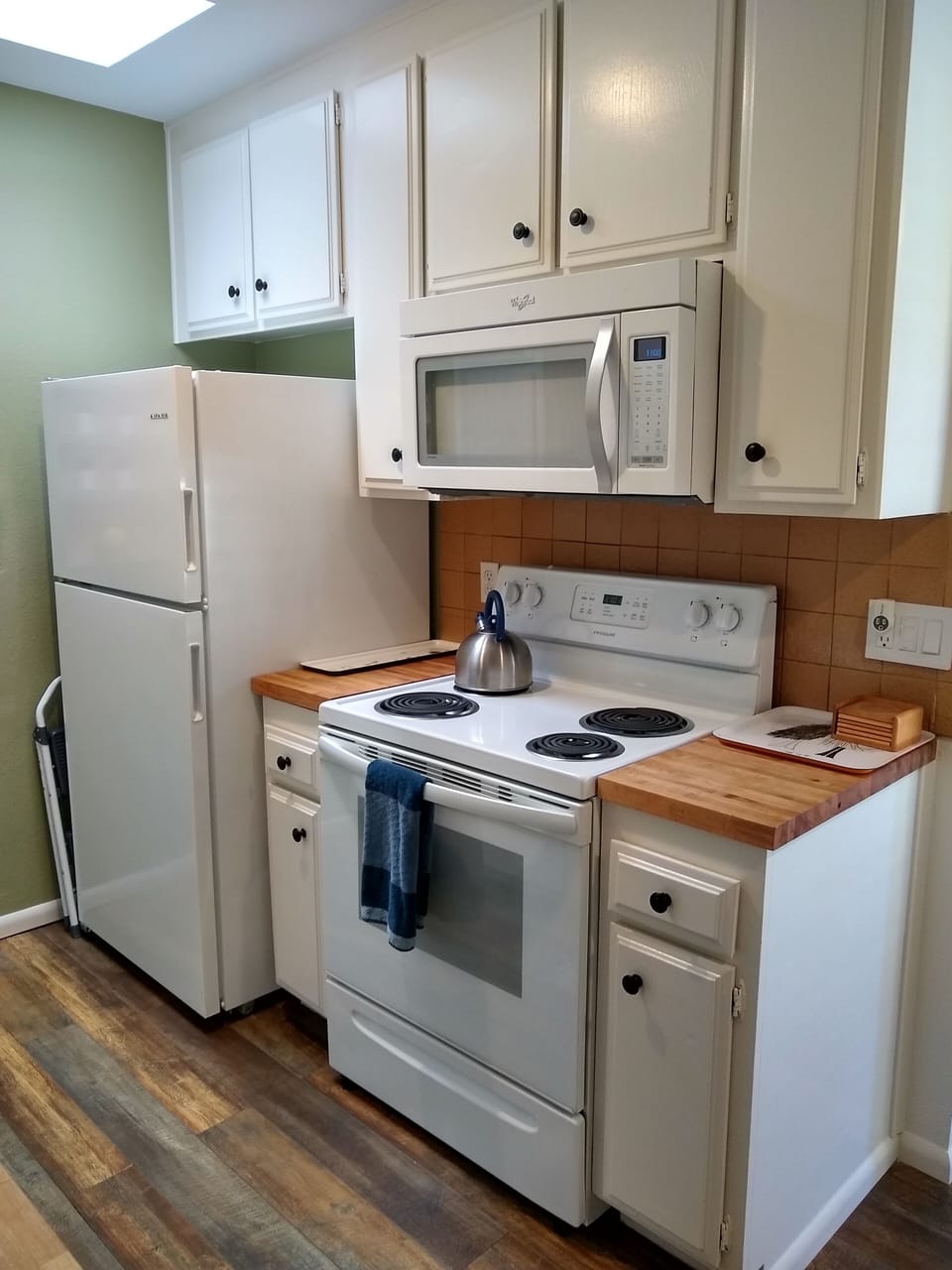 Electric stove and microwave and fridge