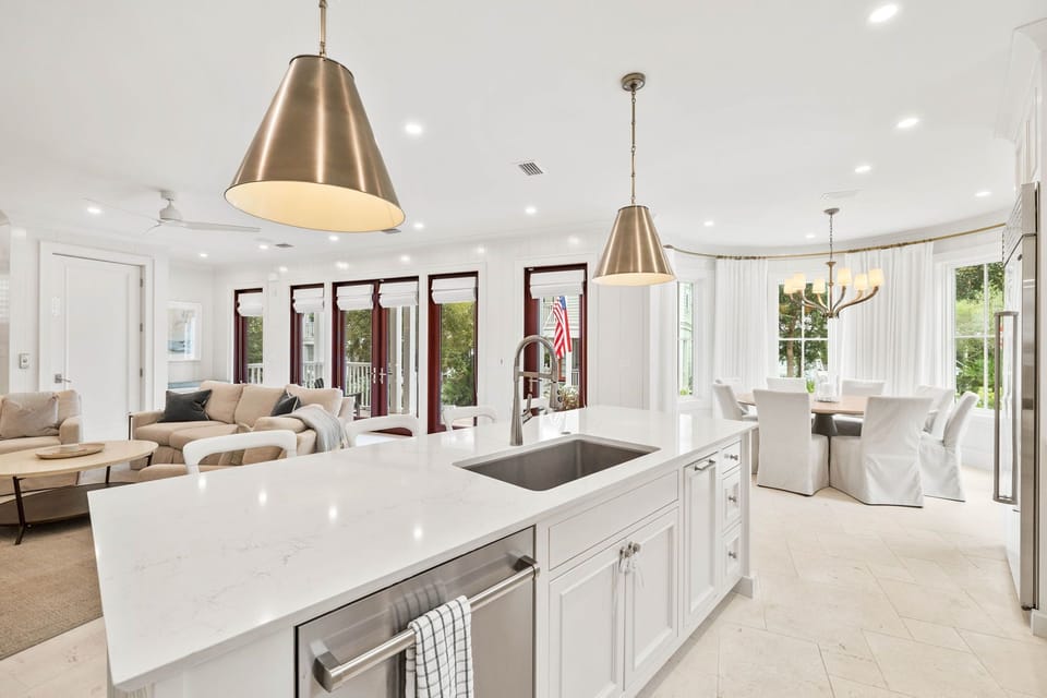 Gourmet Chef's Kitchen with Professional-Grade Appliances, Oversized Island, and Sunlit Dining Nook