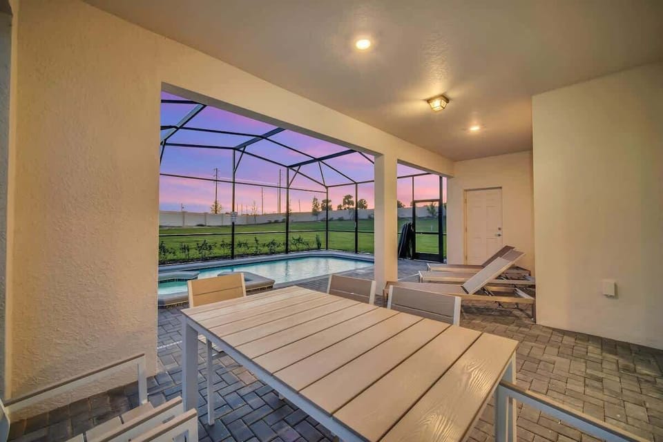 Serene backyard with pool and hot tub
