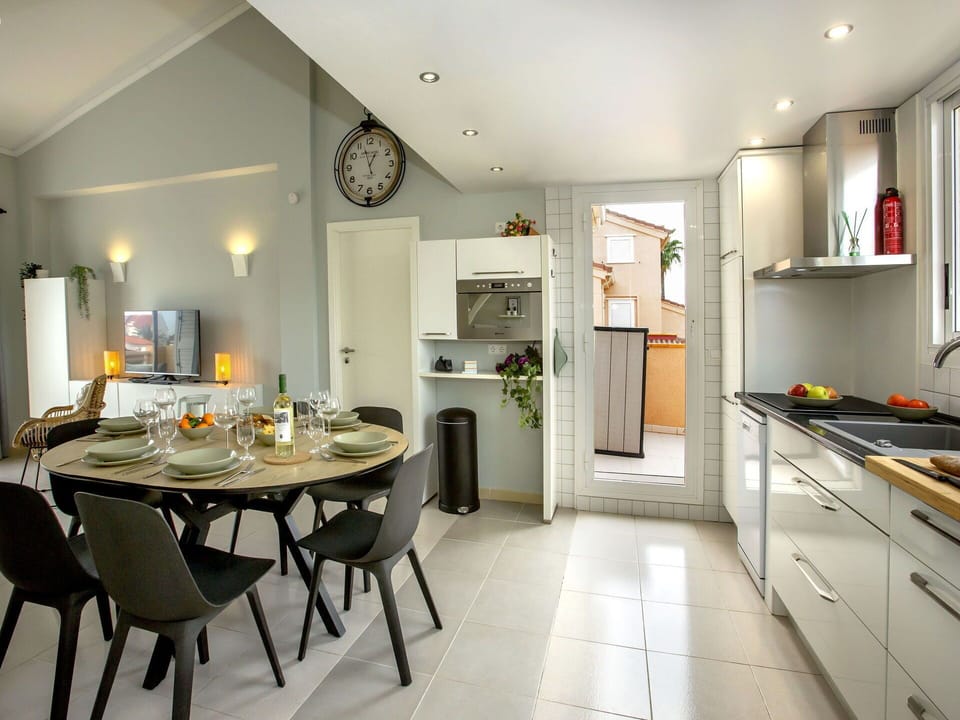 Furniture, Property, Picture Frame, Table, Cabinetry, Countertop, Chair, Interior Design, Kitchen Appliance, Wood