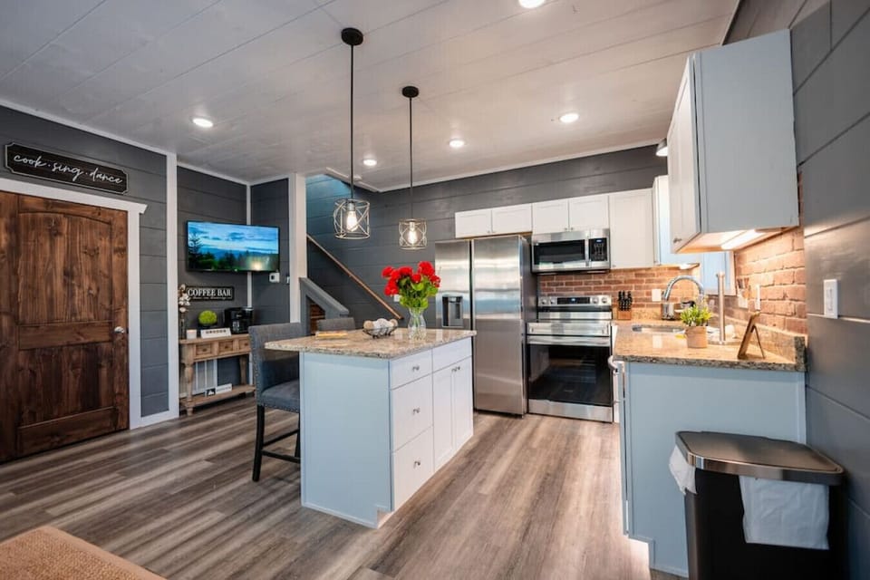 Cook meals together in this fully equipped, modern kitchen.