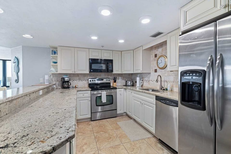 Home away from home, kitchen area with everything needed to prepare your own meals.