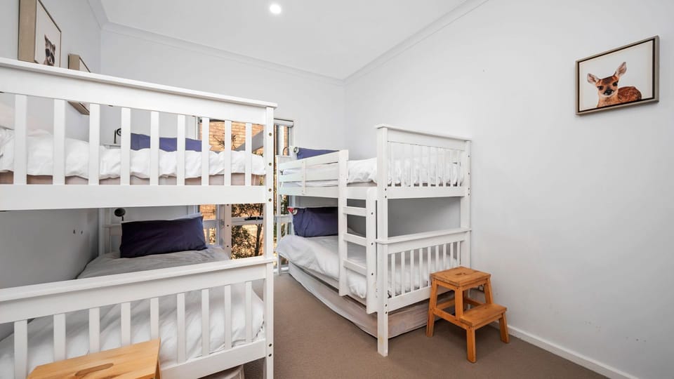  2 Bunk beds and a built-in robe