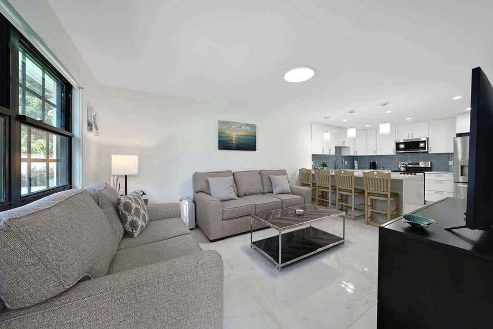 Spacious living room right across the dining area and kitchen. 