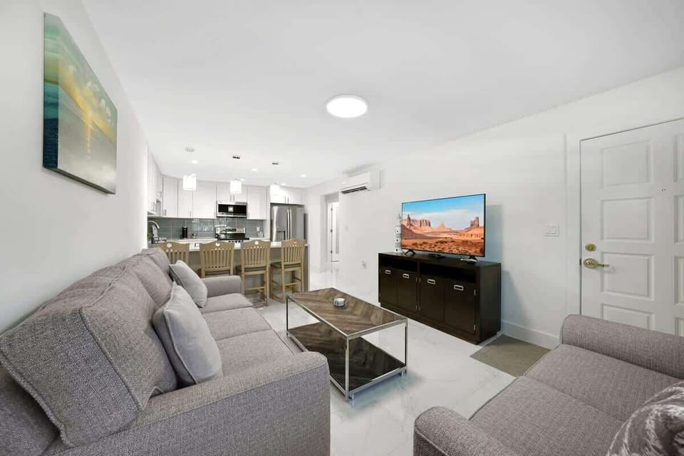 Spacious living room right across the dining area and kitchen. 