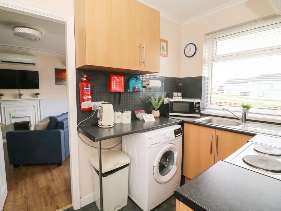 Fridge, electric kettle, toaster, cookware/dishes/utensils