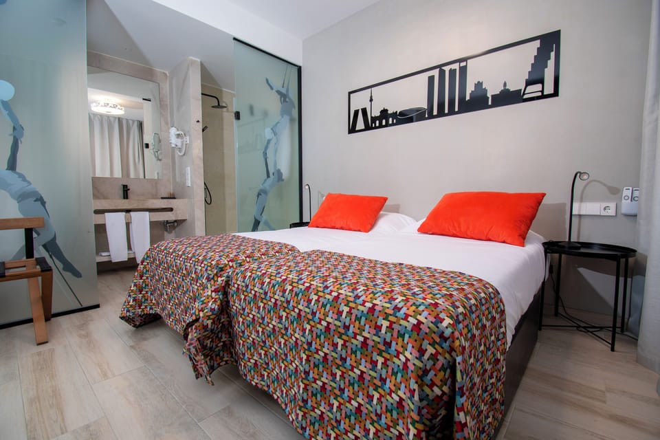 Deluxe Duplex | Premium bedding, down comforters, in-room safe, blackout drapes